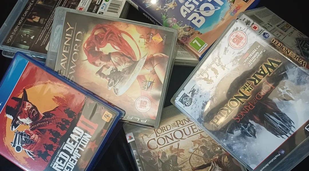A pile of games with their boxes open