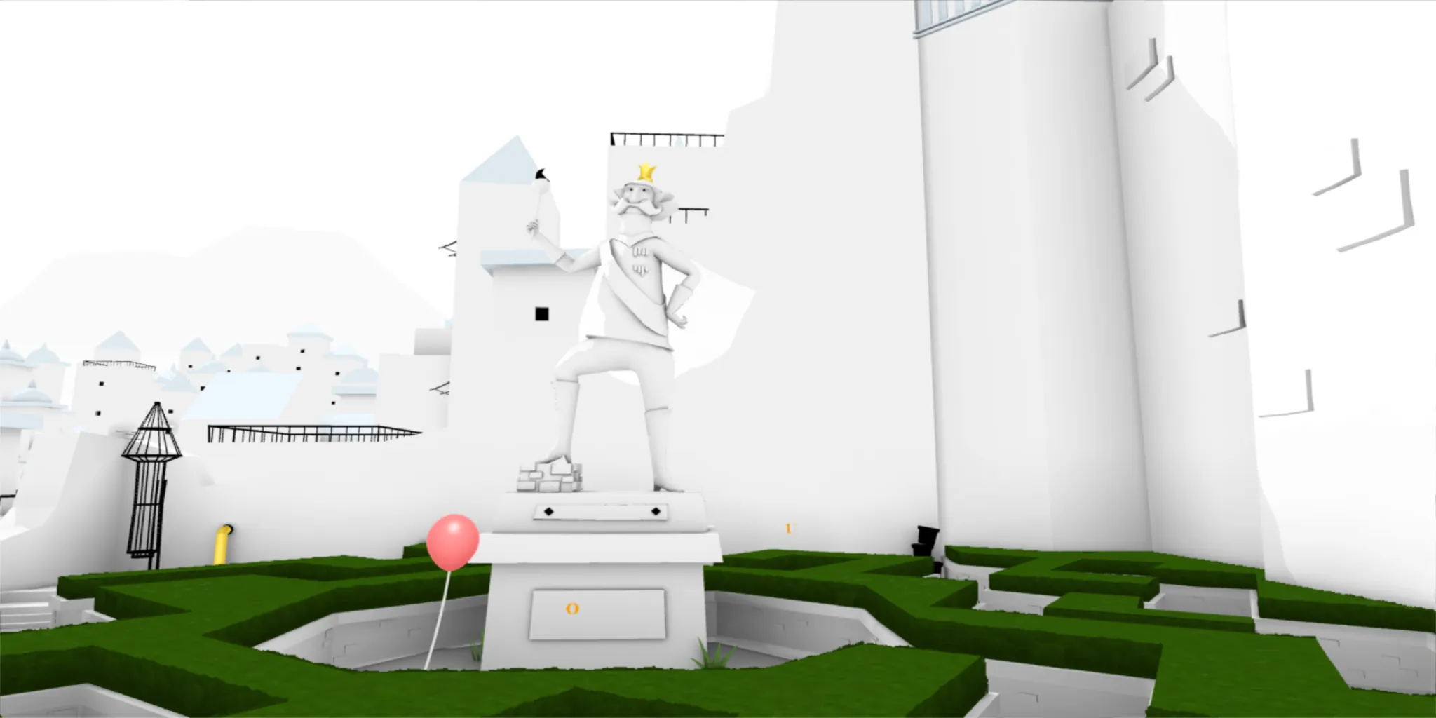 A royal courtyard with grass and a statue of a king.